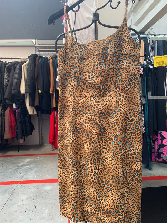 Abito Senza Maniche con Stampa Leopardata - Eleganza Selvaggia e Seducente